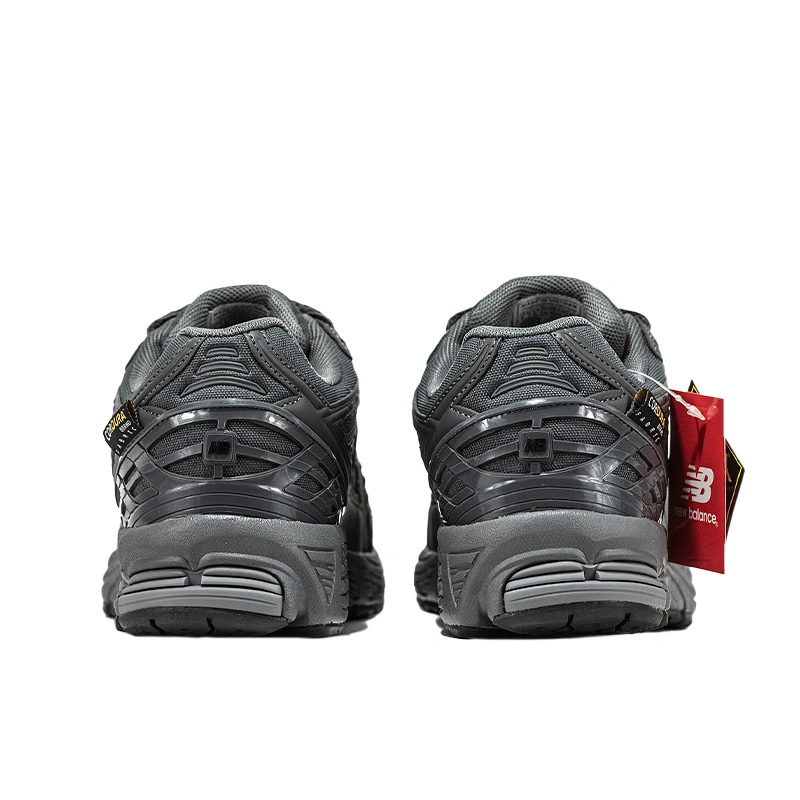 Gray and black new balance top